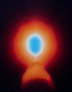 A painting of a blue and orange light.