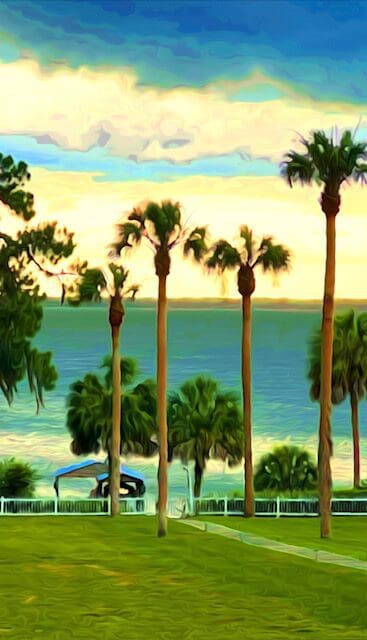 A painting of palm trees in front of the ocean.